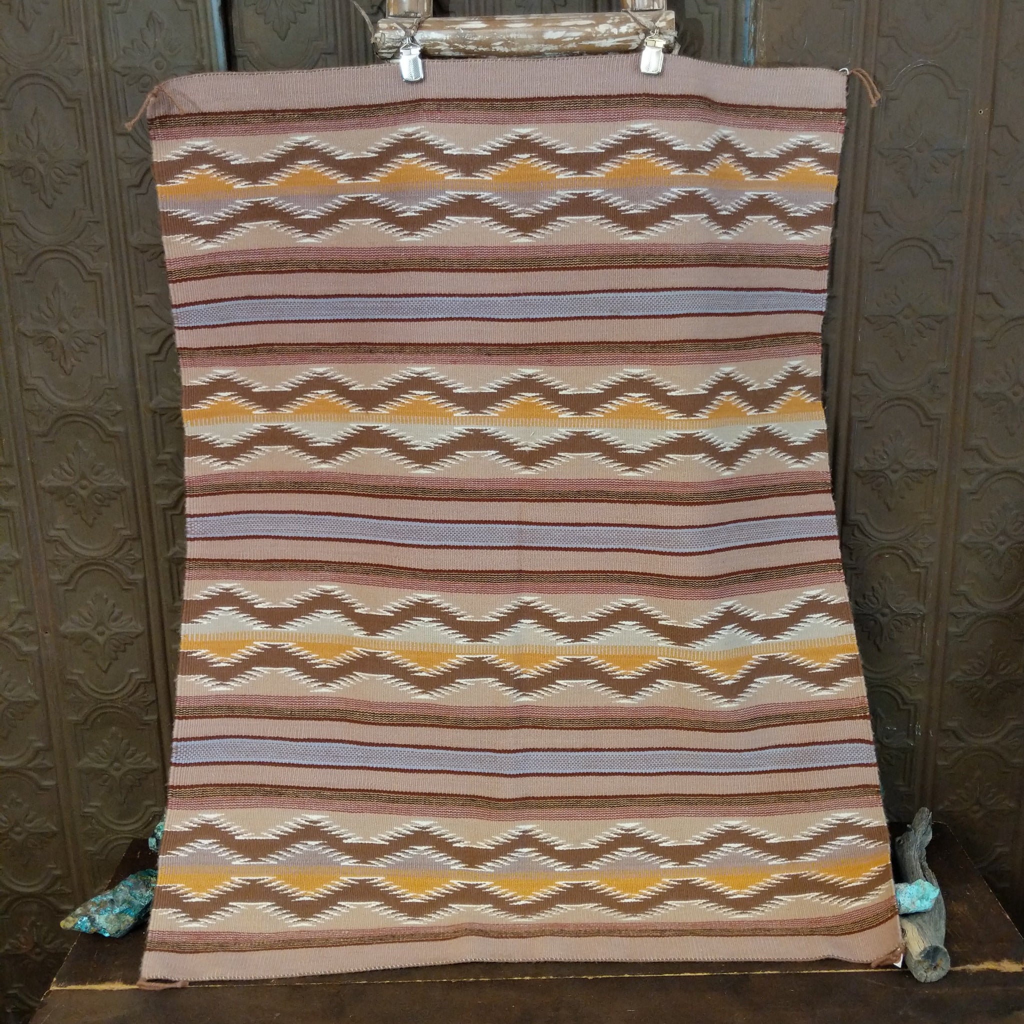 Wide Ruins Navajo Rug features alternating vertical stripes and elongated diamond motifs in soft earth tones 