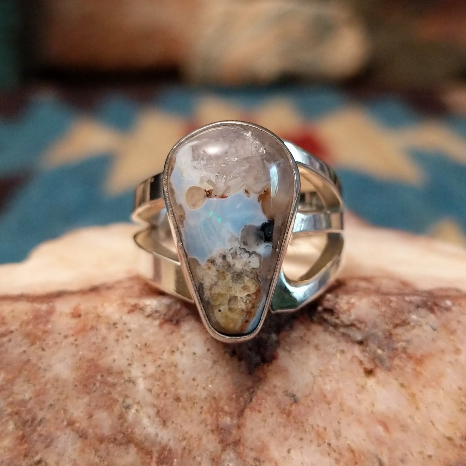 Sterling silver ring with Arizona blue opal set in the teardrop bezel.