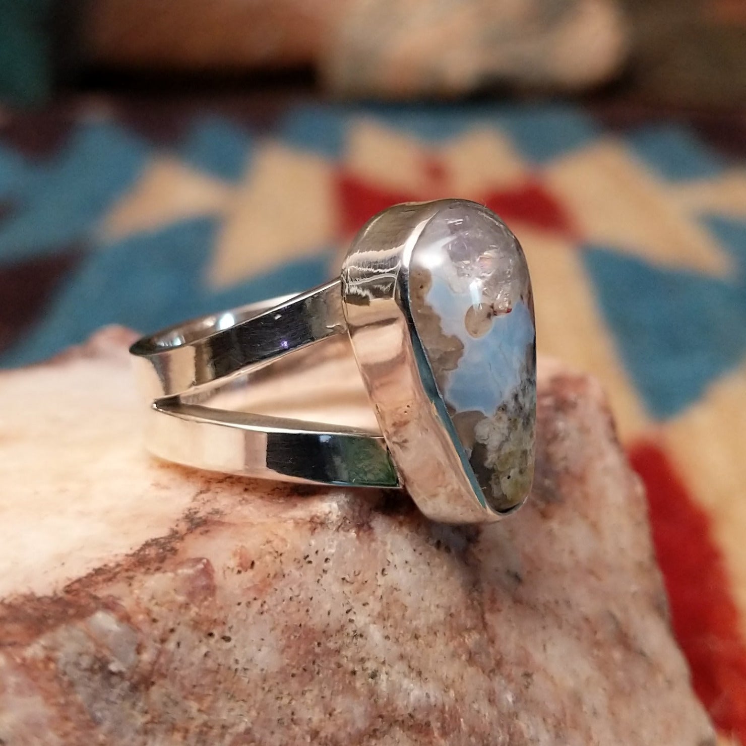Sterling silver ring with Arizona blue opal set in the teardrop bezel.