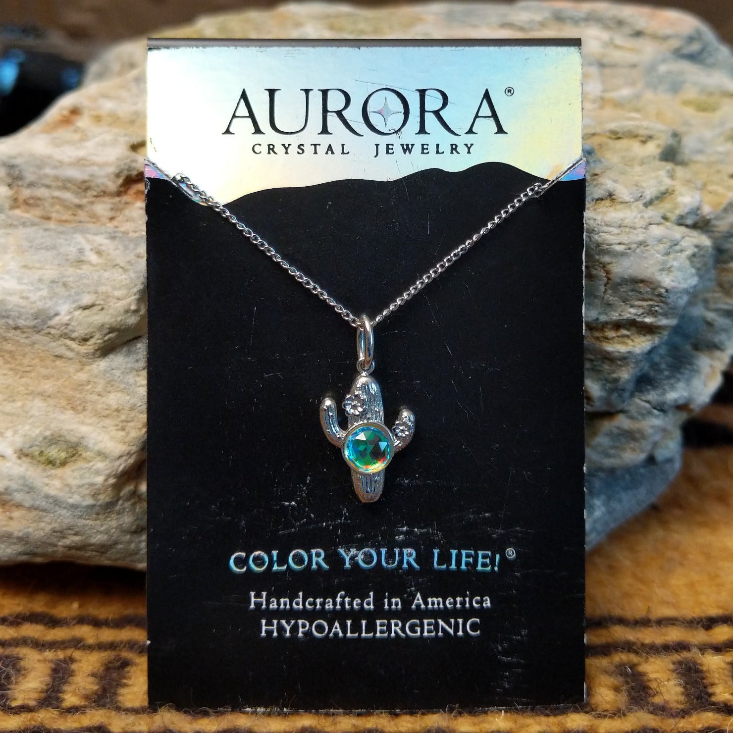 Aurora cactus necklace by LeightWorks, featuring a sparkling crystal pendant with faceted details, in a fun cactus design.