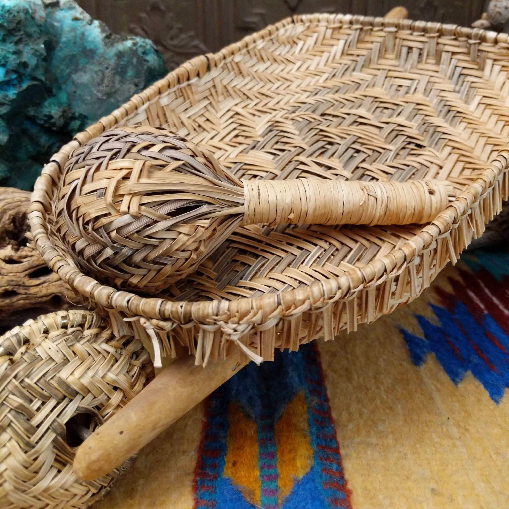 Hopi handwoven wheelbarrow basket rattle by Robelita Martin with a woven basket, wheel, and removable woven rattle.