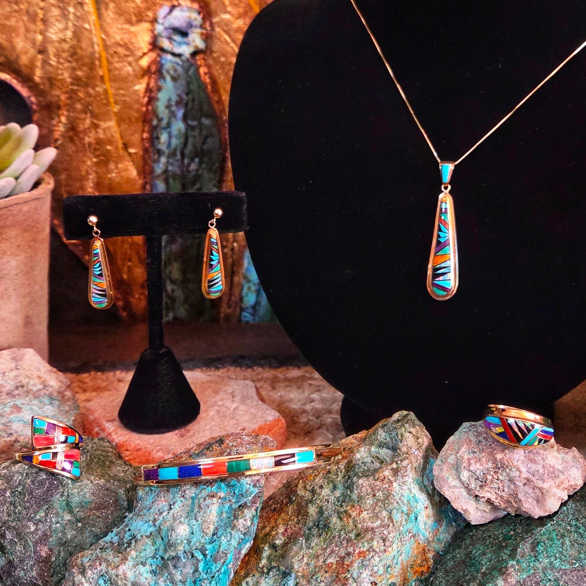 selection of 14K Gold Native American made inlay jewelry